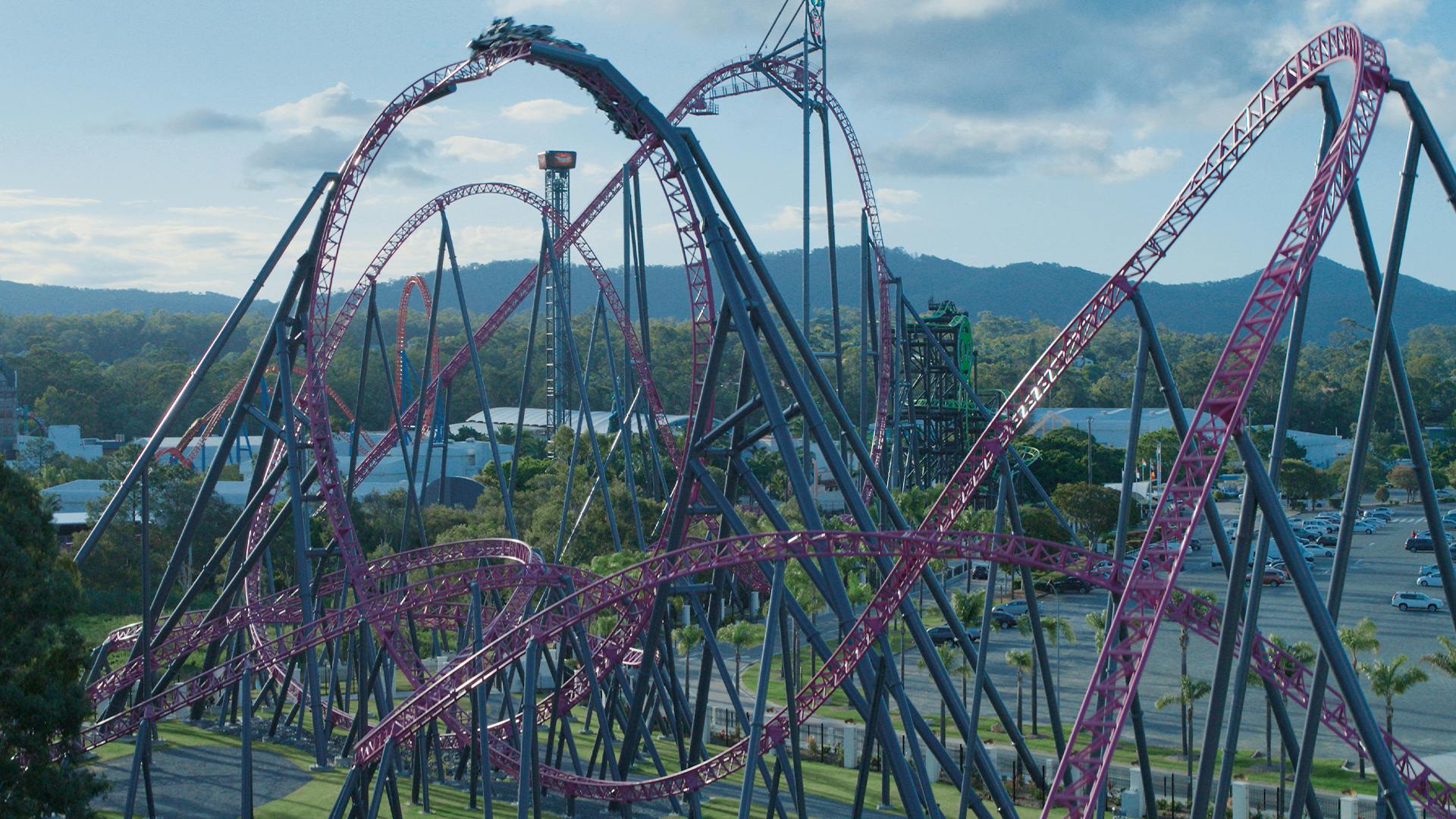 A wide shot capturing the impressive scale and excitement of the DC Rivals HyperCoaster at Warner Bros. Movie World